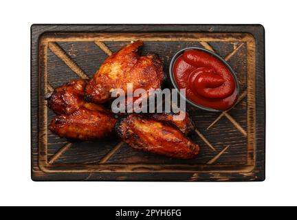 Barbecue-Hühnchen-Büffelflügelsauce auf Holz Stockfoto