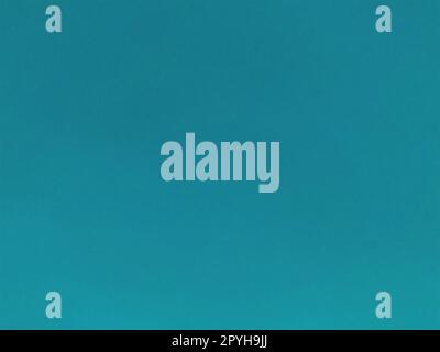 Hintergrund von farbigem Papier. Hintergrund mit Hintergrundstruktur in glänzendem Zyanblau, Grün, Türkis Stockfoto