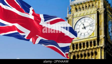 Die britische Flagge winkt auf einem verschwommenen Big-Ben-Hintergrund Stockfoto