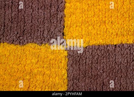 Stoff gelb braun Textur Nahaufnahme Stockfoto