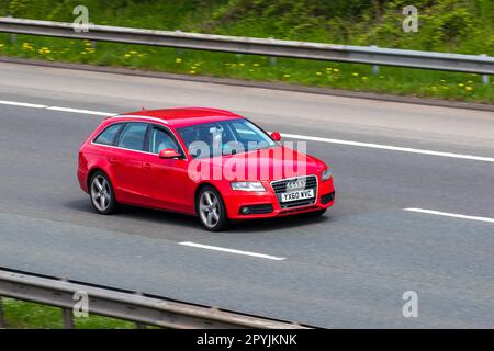 2010 Audi A4 Technik TDI 170 Start/Stop Red Car Estate Diesel 1968 cm3; Fahrt auf der Autobahn M61 UK Stockfoto