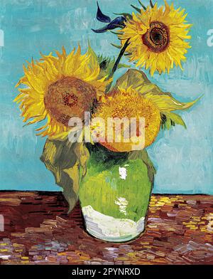 Vincent van Goghs Vase mit drei berühmten Gemälden von Sonnenblumen. Stockfoto