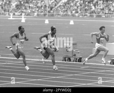 Olympische Spiele, München 1972 / Finale der Herren 100m von rechts : Olympiasieger Valeri Borsov (UdSSR) vor Robert Taylor (2./USA) und Lennox Miller (Jamaika/3.). [Maschinelle Übersetzung] Stockfoto