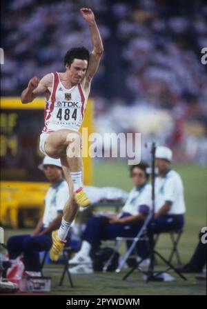 Leichtathletik-Weltmeisterschaft 1991 in Tokio. Weiter Sprung: Dietmar Haaf (Deut.). 30.08.1991. [Automatisierte Übersetzung] Stockfoto