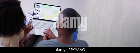 Online-GPS-Standortsuche auf Laptop-Computer Stockfoto