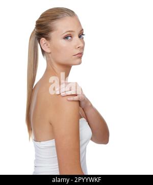 Sie vertraut auf ihr Schönheitsregime. Studioporträt eines attraktiven jungen blonden Modells isoliert auf Weiß. Stockfoto