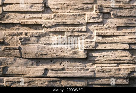 Interessantes Konzept einer Steintextur. Moderne graue Wand als Hintergrund. Stockfoto