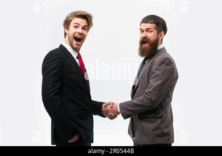 Geschäftstreffen mit Händeschütteln. Geschäftsmann im Anzug. Positive menschliche Emotionen, Mimik. Stockfoto