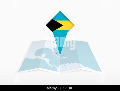 Die Bahamas sind auf einer gefalteten Papierkarte und einer fixierten Positionsmarkierung mit der Flagge der Bahamas abgebildet. Gefaltete Vektorkarte. Stock Vektor