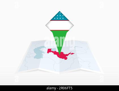 Usbekistan ist auf einer gefalteten Karte in Papierform und einer fixierten Positionsmarkierung mit der Flagge Usbekistans abgebildet. Gefaltete Vektorkarte. Stock Vektor
