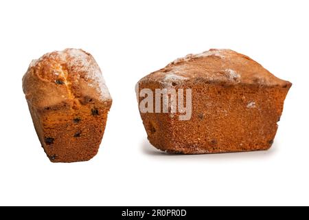 Ein Cupcake mit Rosinen auf weißem Hintergrund. Muffin. Stockfoto