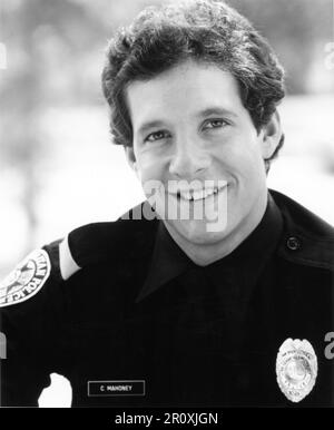 STEVE GUTTENBERG Portrait als Carey Mahoney in DER POLICE ACADEMY 1984 Regisseur / Drehbuch HUGH WILSON Story / Drehbuch Neal Israel und Pat Proft Originalkonzept / Produzent Paul Maslansky Executive Producer Alan Ladd Jr. Ladd Company/Warner Bros Stockfoto