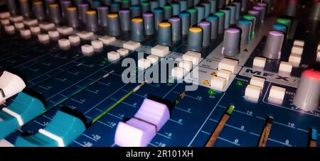 A closeup shot of an audio mixer. Stockfoto