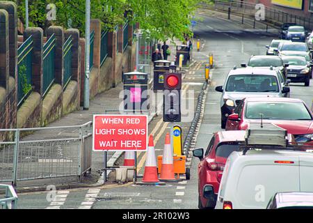 A82 great western road when red light shows wait here roadworks Stock Photo