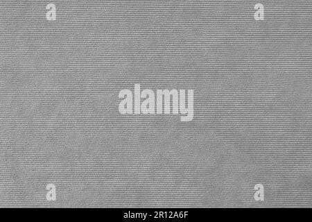 Texturhintergrund aus Velours beigefarbenem Stoff. Polstermaterial aus Samt, Textilmaterial für Cordmöbel, Inneneinrichtung, Einrichtung. Ridge fa Stockfoto