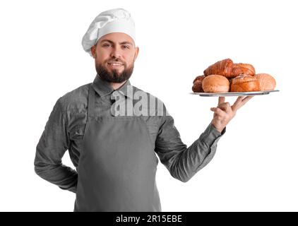 Männlicher Bäcker mit Backblech auf weißem Hintergrund Stockfoto