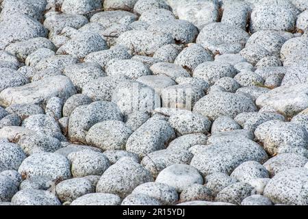 Hintergrund mit viel graue Kieselsteine Stockfoto