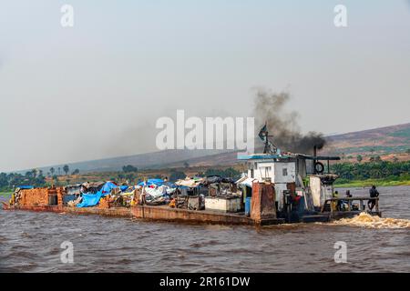 Overloaded riverboat on the Congo river, DR Congo Stock Photo