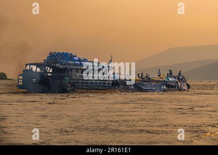 Overloaded riverboat on the Congo river, DR Congo Stock Photo