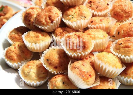 Frische Käse-Muffins als sehr guter Essenshintergrund Stockfoto