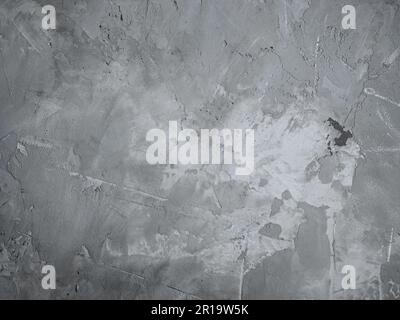 Fliesen- oder Steinoberfläche in neutralen Grautönen. Kunstzement und Betontextur Hintergrund. Verputzte Betonwand, raues Baumaterial grau Stockfoto
