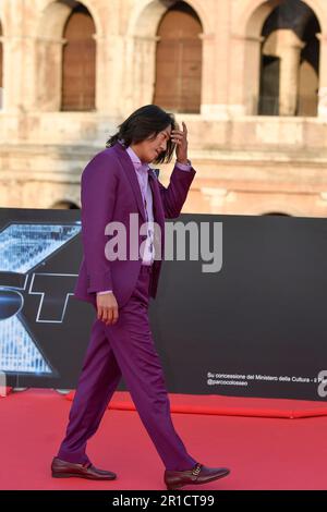 Schauspieler Sung Kang nimmt am 12. 2023. Mai im Kolosseum in Rom (Italien) an der „Fast X“-Filmpremiere Teil, dem zehnten Film in der „Fast & Furious Saga“. Stockfoto