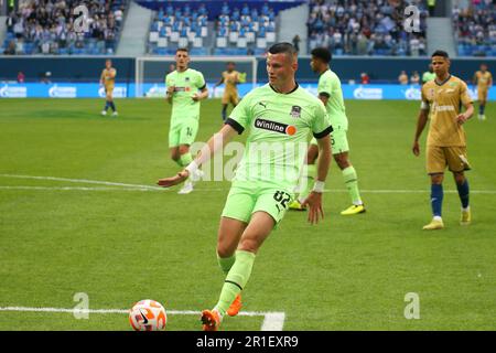 Sankt Petersburg, Russland. 13. Mai 2023. Sergey Volkov (Nr. 82) von Krasnodar in Aktion während des Fußballspiels der russischen Premier League zwischen Zenit St. Petersburg und Krasnodar in der Gazprom Arena. Das Team des FC Zenit gewann gegen Krasnodar mit einem Endstand von 2:2. Zenit St. Petersburg bleibt an der Spitze der russischen Premier League. Kredit: SOPA Images Limited/Alamy Live News Stockfoto