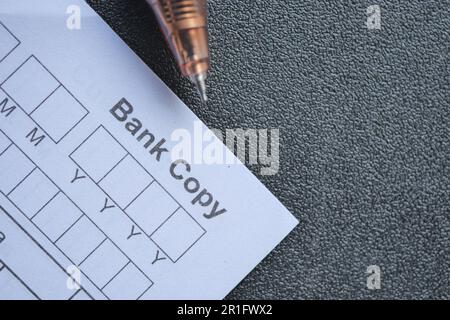 Detailfoto des Bankschecks mit einer Kopie der Bank Stockfoto