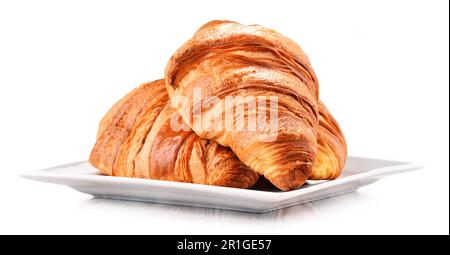 Zusammensetzung mit Croissants auf weißem Hintergrund Stockfoto