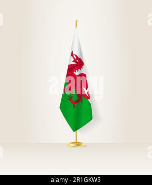 Wales-Flagge auf einem Flaggenstand. Vektordarstellung. Stock Vektor
