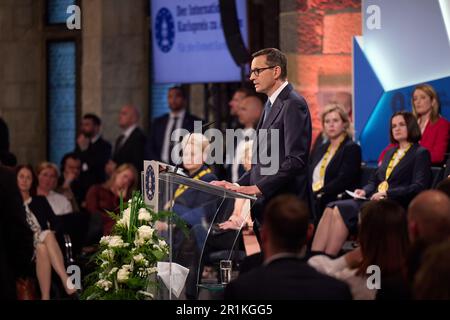 Aachen, Deutschland. 14. Mai 2023. Der polnische Ministerpräsident Mateusz Morawiecki spricht während der Verleihung des Internationalen Karlspreises Aachen 2023 (Karlspreis) an den Präsidenten und das ukrainische Volk am 14. Mai 2023 in Aachen. Der ukrainische Präsident Volodymyr Zelensky und das Volk seines Landes werden am Sonntag, den 14. Mai, in Aachen mit dem Internationalen Karlspreis ausgezeichnet. Foto: Pressestelle des ukrainischen Präsidenten/UPI Credit: UPI/Alamy Live News Stockfoto