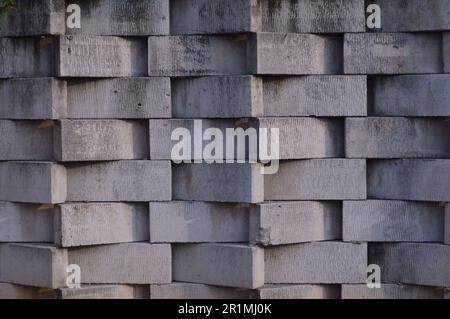 Hintergrundmuster, Form, Struktur der Wände oder Wände aus hellem Ziegelstein oder weißem Hebel-Ziegel Stockfoto