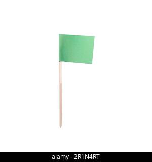 Kleine grüne Papierfahne, isoliert auf weiß Stockfoto