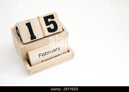 Ewiger Kalender aus Holz, der den 15. Februar zeigt Stockfoto