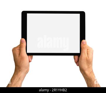Isoliertes digitales Tablet in schwarzer Farbe in weiblichen Händen, leerer Bildschirm eines Tablets. Stockfoto
