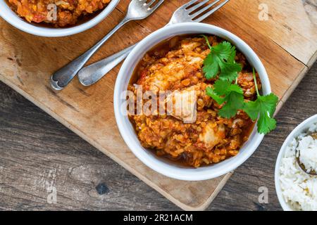 Hähnchen Dhansak Curry mit Reis Stockfoto