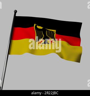 Die deutsche Flagge weht im Wind, auf grauem Hintergrund. Das dreifarbige Design ist mit schwarzen, roten und goldenen Streifen versehen. Die Farben symbolisieren Deutschlands Kämpfe, Stockfoto