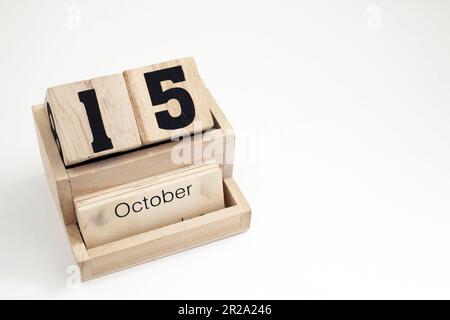 Ewiger Kalender aus Holz, der den 15. Oktober zeigt Stockfoto