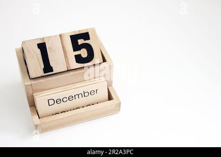 Ewiger Kalender aus Holz mit dem 15. Dezember Stockfoto