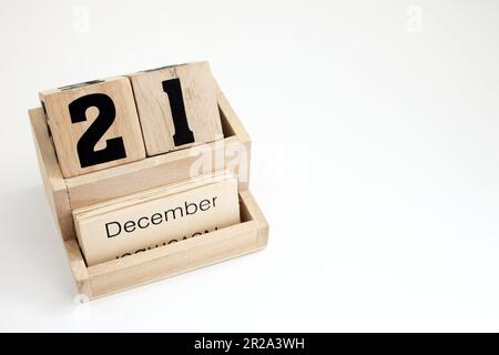 Ewiger Kalender aus Holz mit dem 21. Dezember Stockfoto