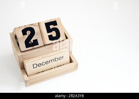 Ewiger Kalender aus Holz mit dem 25. Dezember Stockfoto