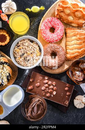 Lebensmittelerzeugnisse, die eine erhebliche Menge Zucker enthalten. Junkfood Stockfoto