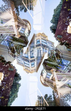 Doppelter Blick auf ein farbenfrohes Holzwohngebäude im viktorianischen Stil in der Hayes Street in San Francisco, Kalifornien. Stockfoto