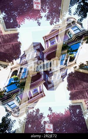 Doppelter Blick auf ein farbenfrohes Holzwohngebäude im viktorianischen Stil in der Hayes Street in San Francisco, Kalifornien. Stockfoto