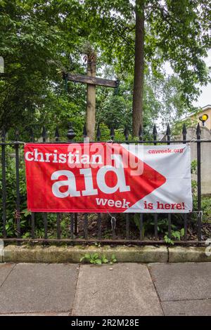 Christian Aid Week ist hier vor der Kirche St. Mary, Mortlake High Street, Mortlake, London, SW14, England, Großbritannien Stockfoto