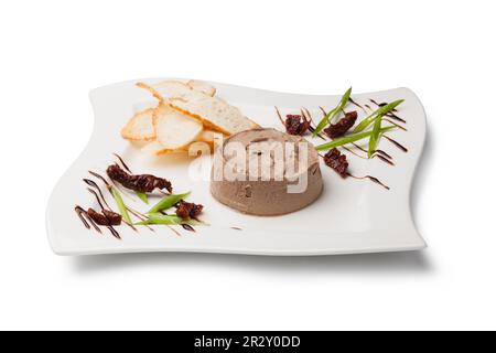 Leberpastete auf einer weißen Platte Stockfoto