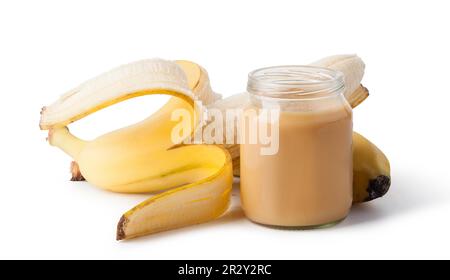 Glas mit Banane Babynahrung isoliert auf weißem Stockfoto