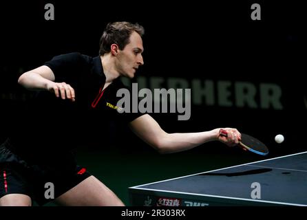 Durban, Südafrika. 21. Mai 2023. Cedric Nuytinck (Belgien) erzielt eine Rendite gegen Patrick Franziska (Deutschland) während der 1. Runde der Männerspiele im Rahmen der ITTF Table Tennis World Championships Finals 2023 in Durban, Südafrika, am 21. Mai 2023. Kredit: Zhang Yudong/Xinhua/Alamy Live News Stockfoto