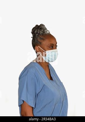 Eine Krankenschwester, gekleidet in ihren Krankenhauspflegern. Stockfoto