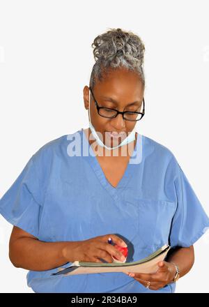 Eine Krankenschwester, gekleidet in ihren Krankenhauspflegern. Stockfoto